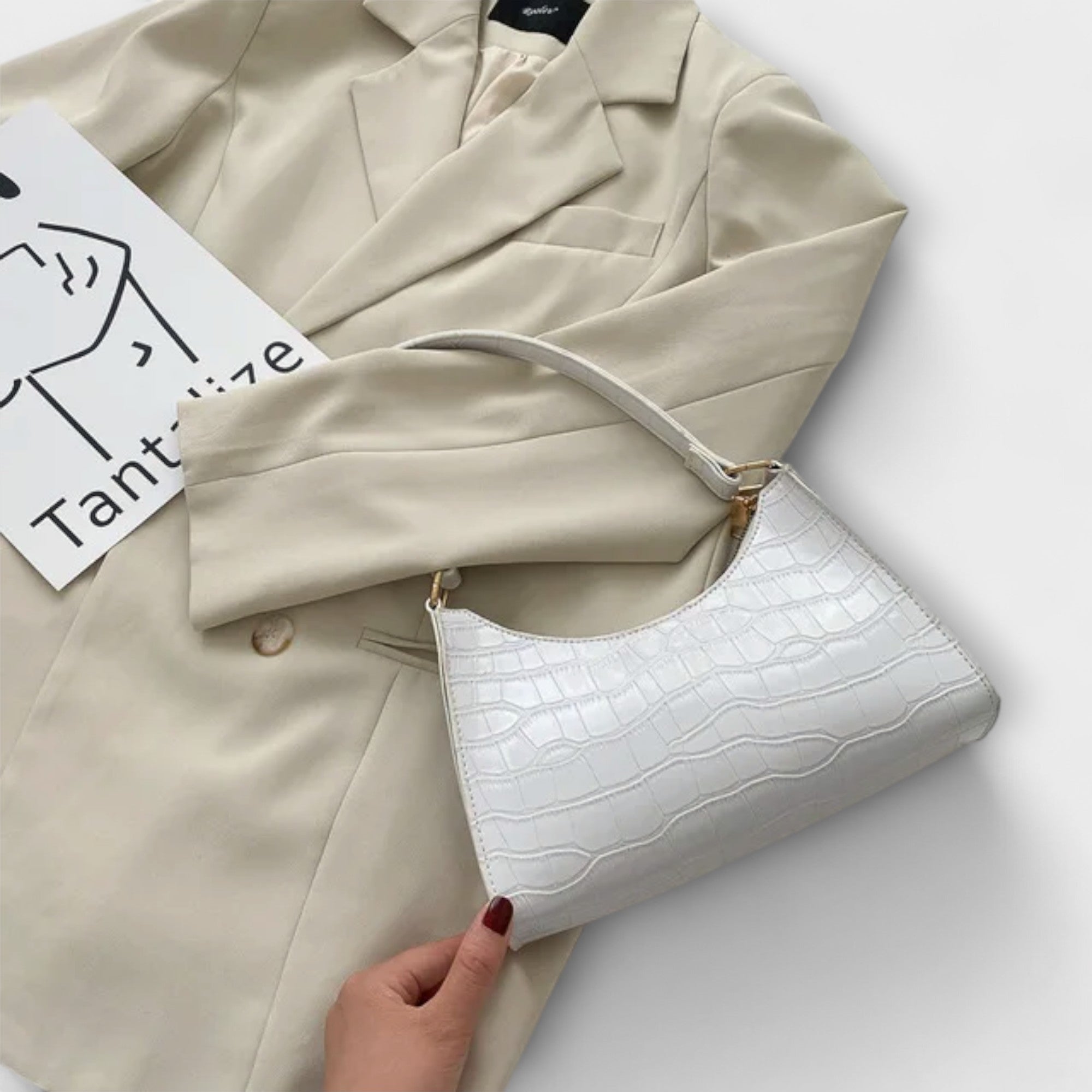 Lora. - Lesklá kožená taška